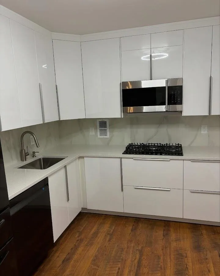 Restored kitchen with white cabinets after water damage in Eastchester